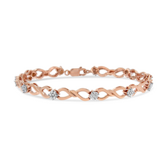 Elegant 10K Rose Gold 1/2 cttw Diamond Cluster & Infinity Weave Link Bracelet - Size 7"