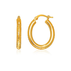 14k Yellow Gold Diamond Cut Textured Oval Hoop Earrings. - Sable Gold